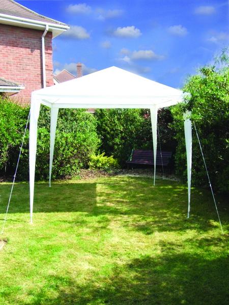 Green Powder coated Ground anchor by RiggFix in use for a marquee